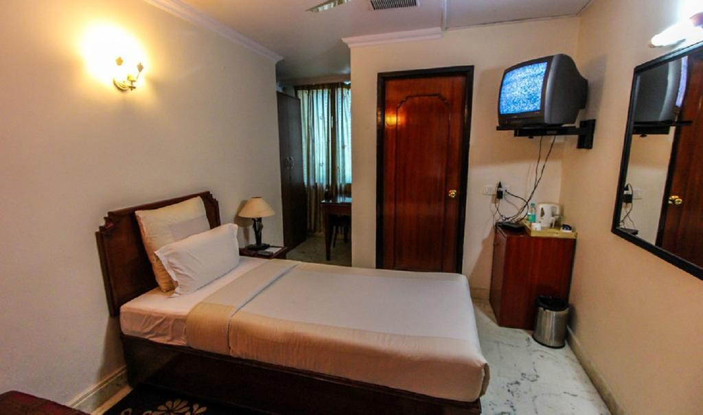 Hotel Pigeon International Бангалор Экстерьер фото